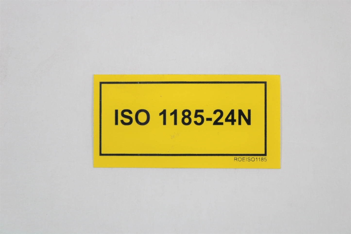 STICKER GEEL "ISO 1185-24N"       60 X 30 MM